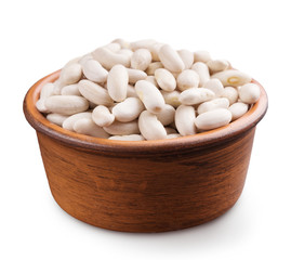 Wooden bowl full of white beans