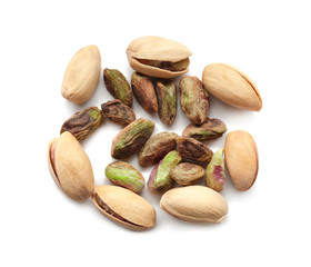Tasty pistachio nuts on white background