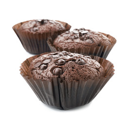 Tasty chocolate muffins on white background