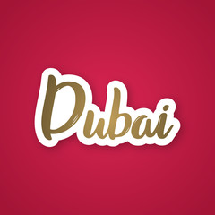 Dubai - handwritten name of the city. Sticker with lettering in paper cut style. Vector design template.
