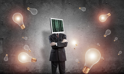 Businessman with monitor instead of head.
