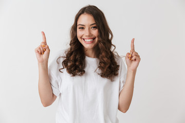 Close up portrait of a cheerful young casual brunette woman
