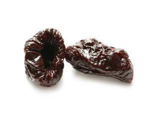 Prunes on white background