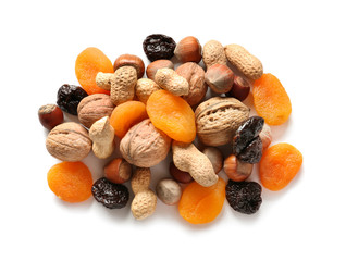 Different nuts with dried fruits on white background