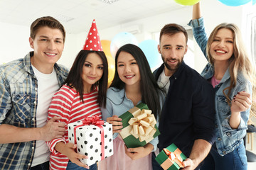 Young people at birthday party indoors