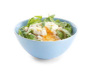 Bowl with delicious oatmeal, herbs and egg on white background