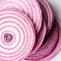 Sliced fresh red onion
