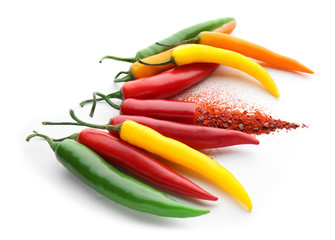 Colorful hot chili peppers on white background