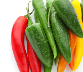 Fresh hot chili peppers on white background, closeup