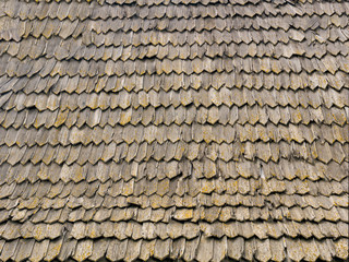 The texture of the old tile on the roof of the church. Mockup. roof. Background