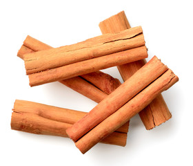 cinnamon sticks isolated on the white background, top view