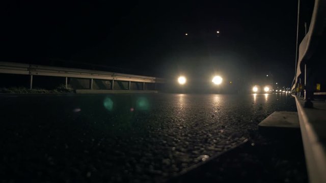 Truck Headlights on Highway at Night