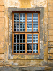 Windows on the facade of houses in the old city
