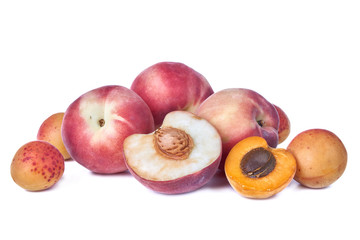 Fresh delicious apricot and peach fruits isolated on white background