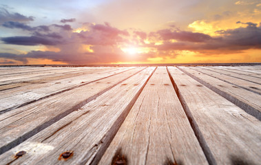 Wooden plates with sunset sky