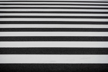 Crosswalk in Black and white on the asphalt road. Pedestrian on the road