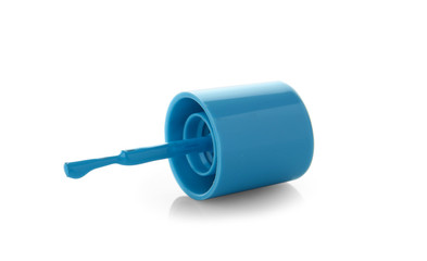 Brush with color nail polish on white background