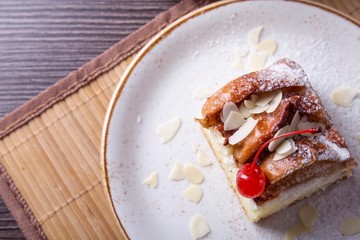 Tasty apple pie on a plate. Top view