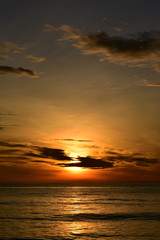 Fantastic sunset over sea. Vertical background for publications on your smartphone