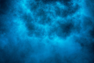Obraz na płótnie Canvas Explosion of blue powder.