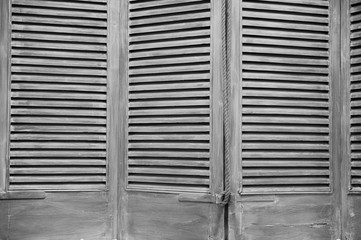 Black and white window shutters