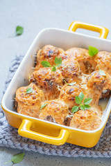 Meatballs in creamy tomato sauce