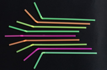 Bright colorful party cocktail straws art design shape .