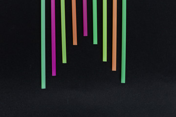 Decorative colored party drink straws shape design.