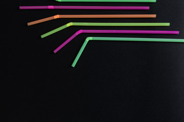 Bent colorful plastic straws design pattern shape.