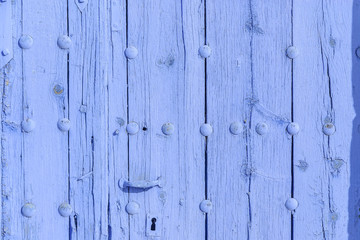background with old wooden door of indigo color.