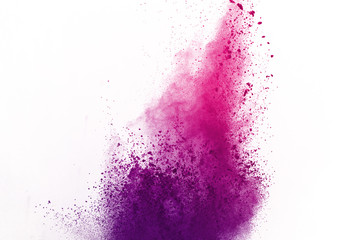 Abstract of colored powder explosion on white background. multicolor powder splatted isolate....