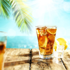 Summer drink of ice tea and palm 