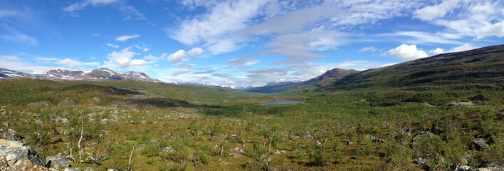 Fototapeta premium Panorama of Norwegian tundra with mountains and lake
