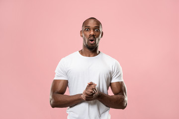 The young attractive man looking suprised