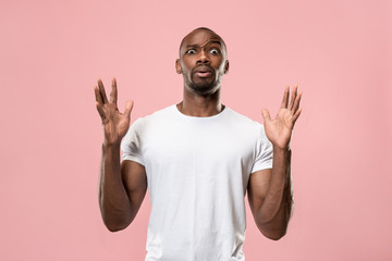 The young attractive man looking suprised