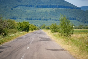 Fototapeta premium Ukrainian country road at summer