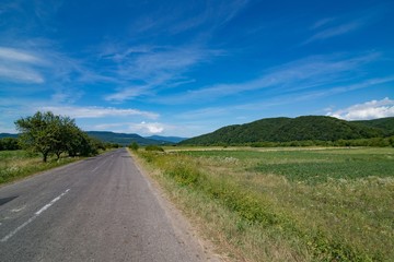 Fototapeta na wymiar Ukrainian country road at summer