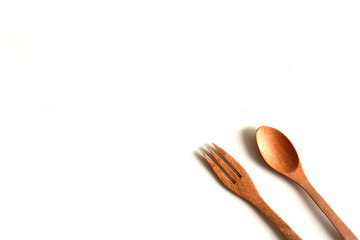 Wooden utensils on a white background,spoon,fork