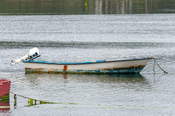 wooden fishing boat anchored