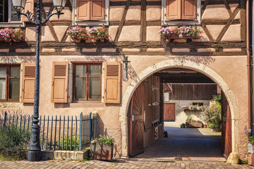 .Half-timbered architecture in Alsace. The ancient city of Aegisheim. Wine Road Alsace. France