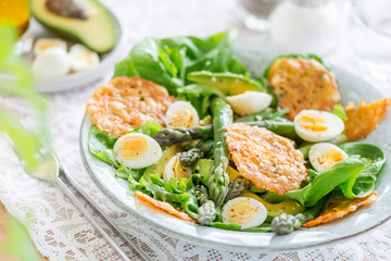 Asparagus Salad with quails eggs and cheese crisps