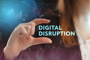 The concept of business, technology, the Internet and the network. A young entrepreneur working on a virtual screen of the future and sees the inscription: digital disruption