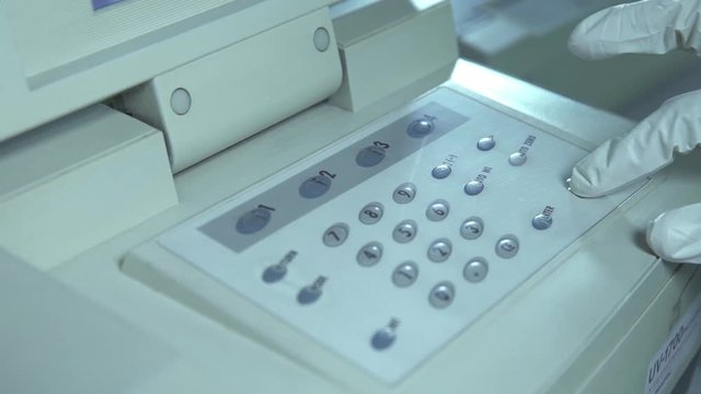 Scientis Closing A Machine And Turning It On 