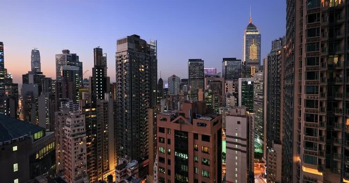 Hong Kong skyline at sunset. Modern city urban architecture cityscape panorama