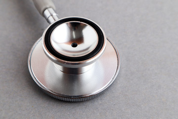 Medical equipments including stethoscope medicines background, top view flat lay