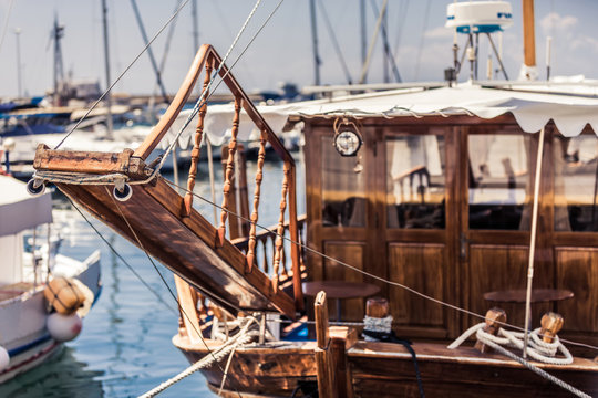 Wooden boat sailboat in harbor