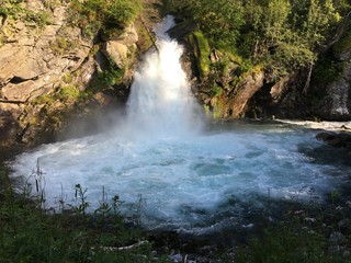 Waterfall Dynamitfossen in Geiranger village, Norway