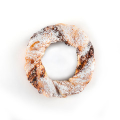 Covered glazed with powder and chocolate, top view over white background, isolated