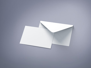 Opened envelope with blank card. Blank envelope with post card on dark background.