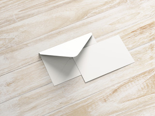 Opened envelope with blank card. Blank envelope with post card on dark background.